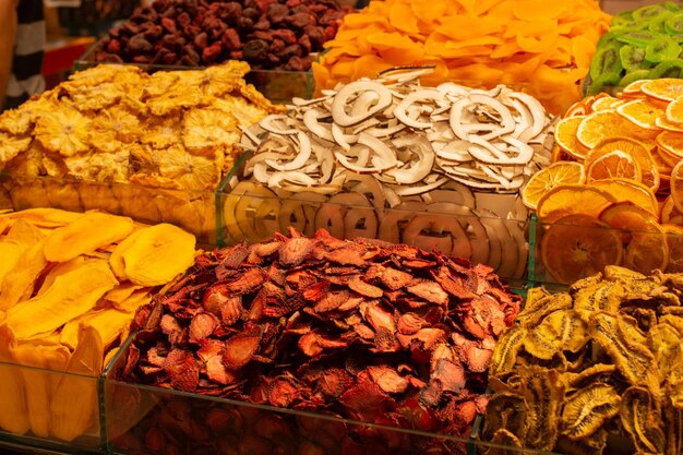 A colorful retail display of assorted dry fruits arranged to attract health-conscious shoppers