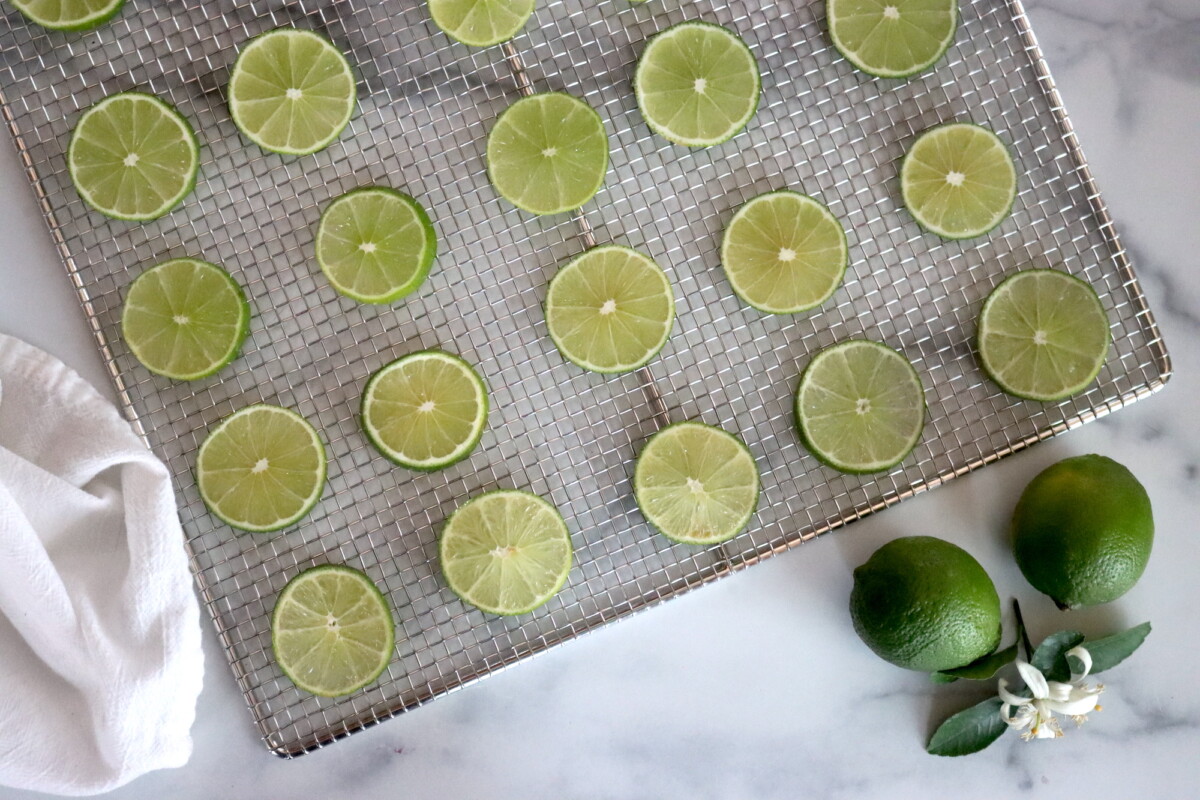 Premium dried lime slices naturally retaining their fragrance and golden-tan tones