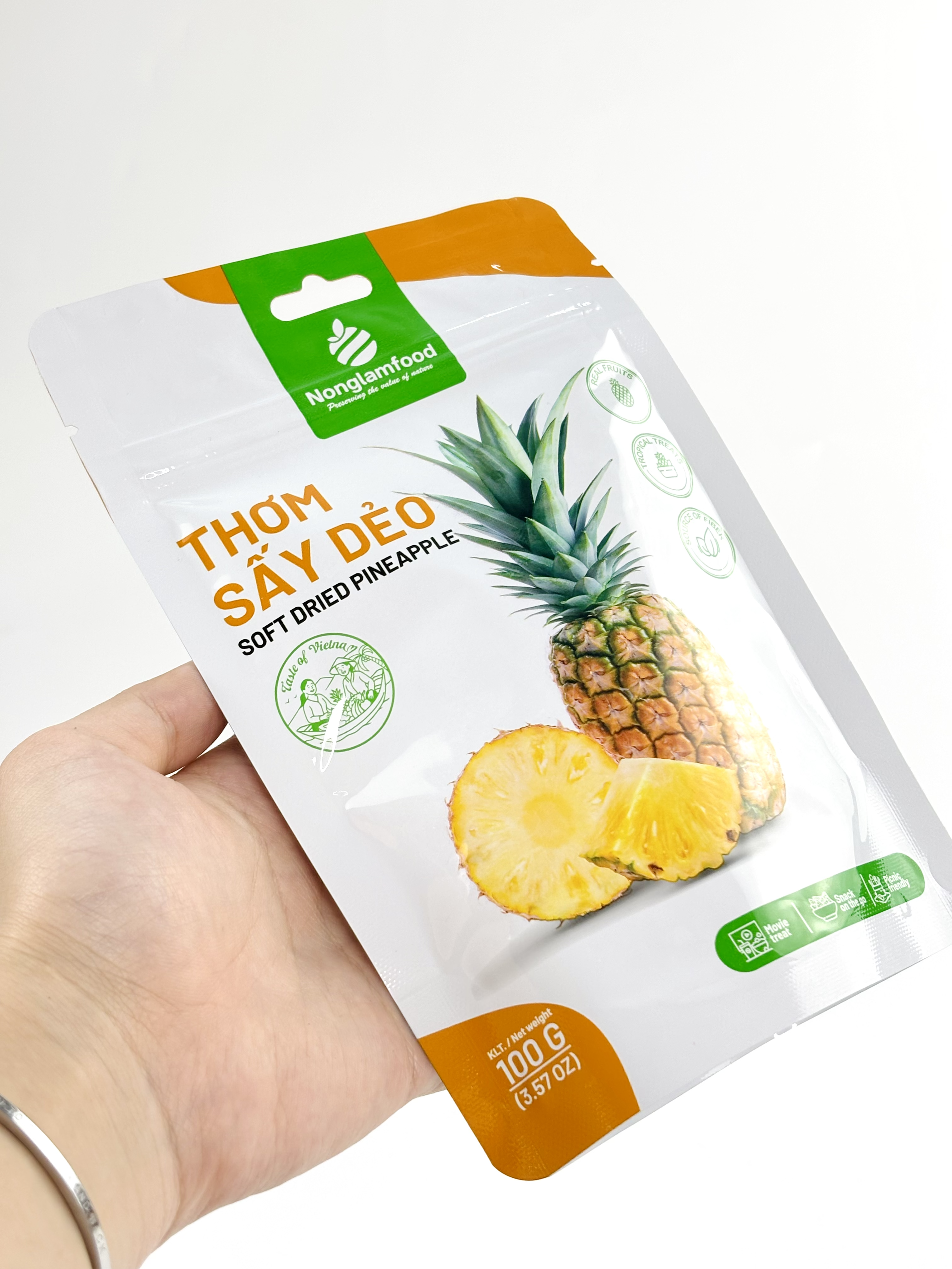 A glass of pineapple and ginger dry fruit smoothie