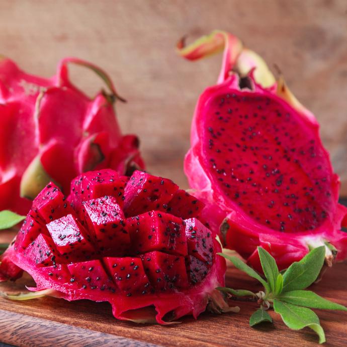 Antioxidant-rich red dragon fruit and other premium tropical fruits prepared for drying
