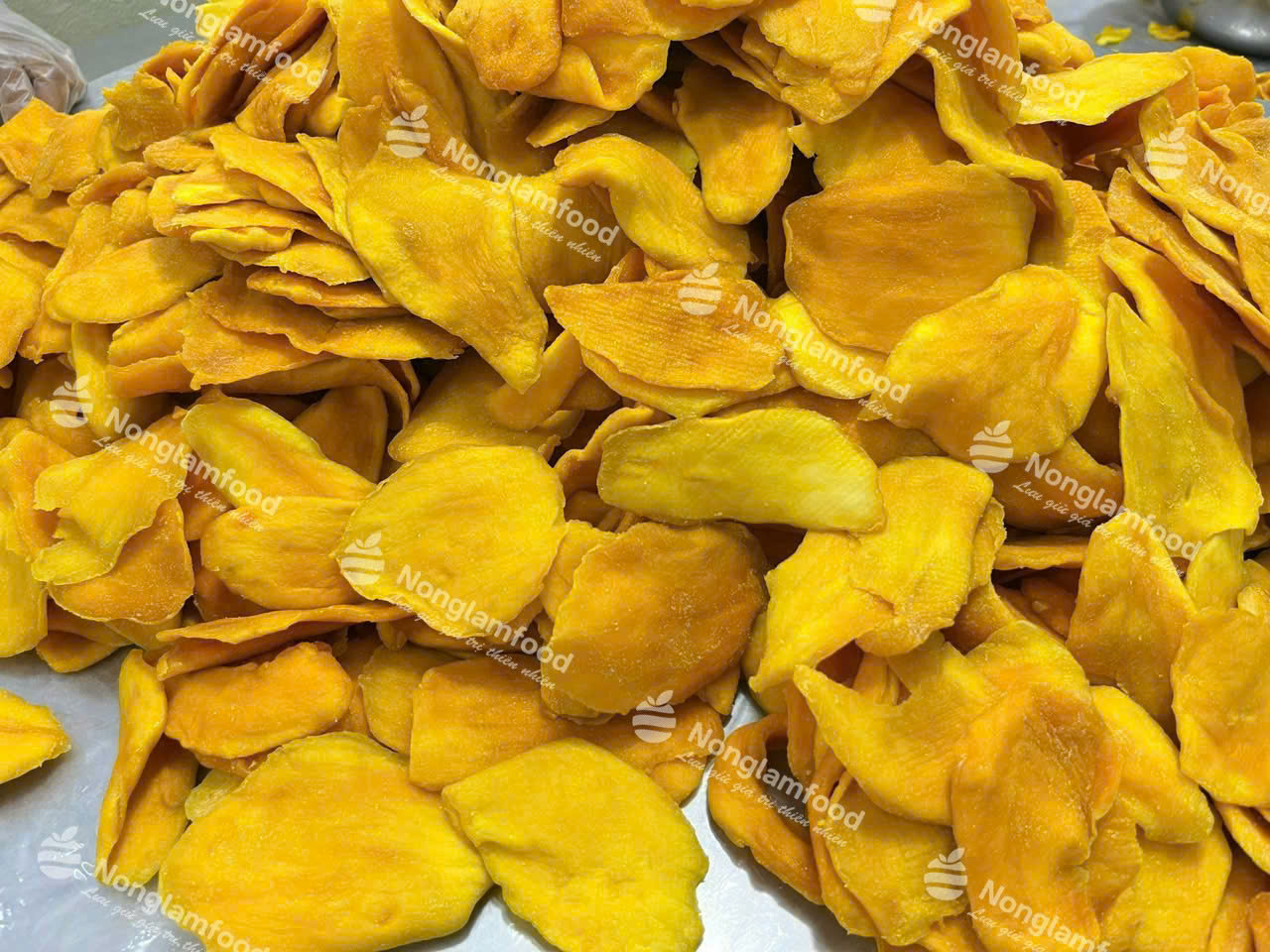Quality control testing for moisture content and water activity in dried fruit production