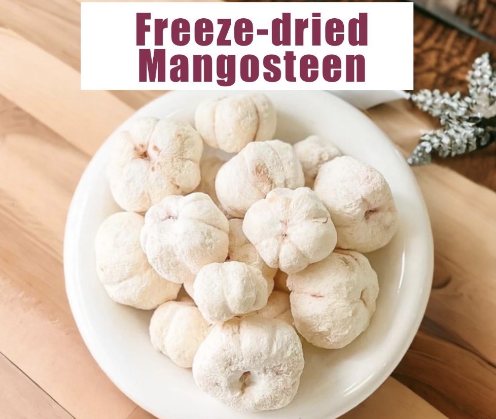 A white bowl filled with premium white freeze-dried mangosteen pieces