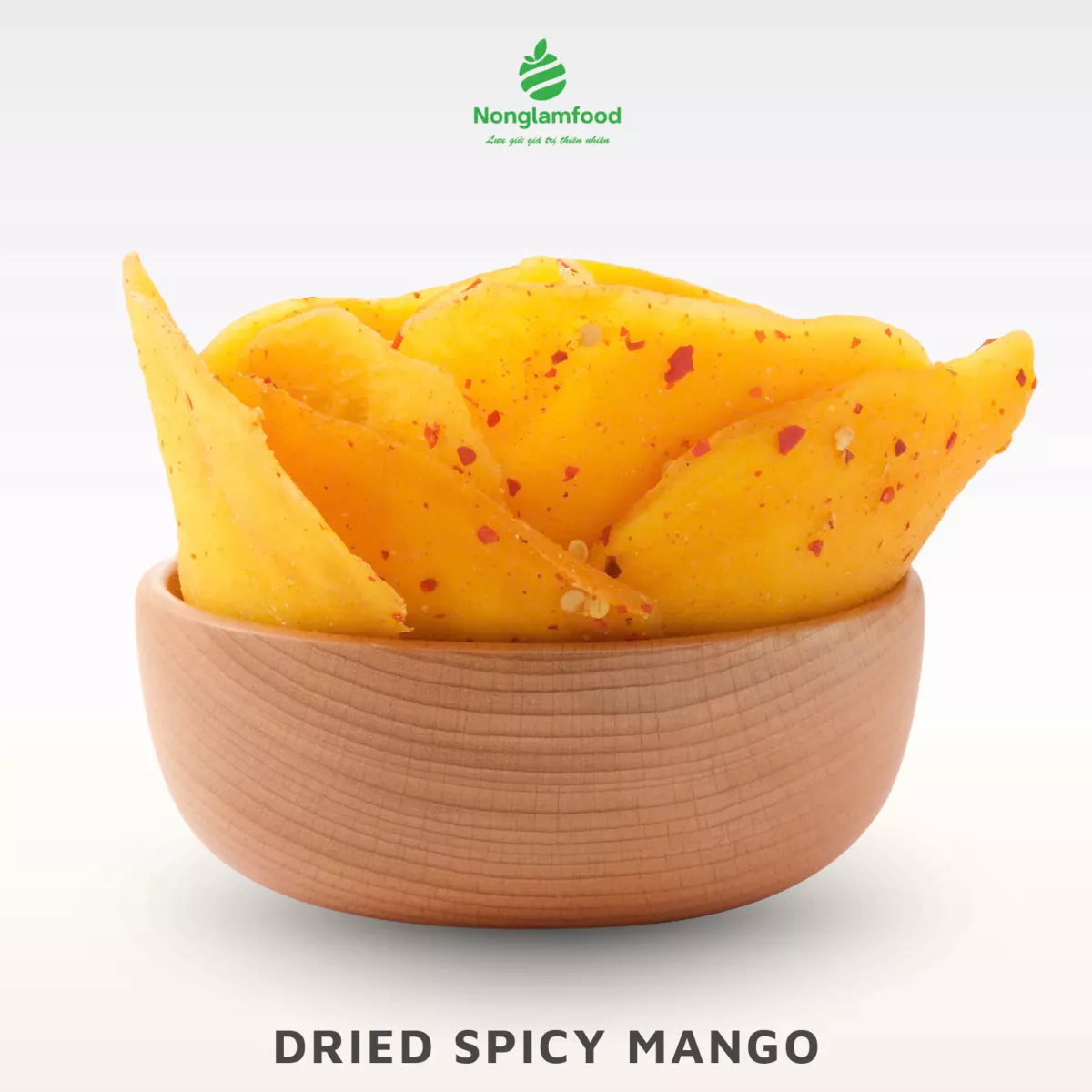 Dried Spicy Mango in a wooden bowl